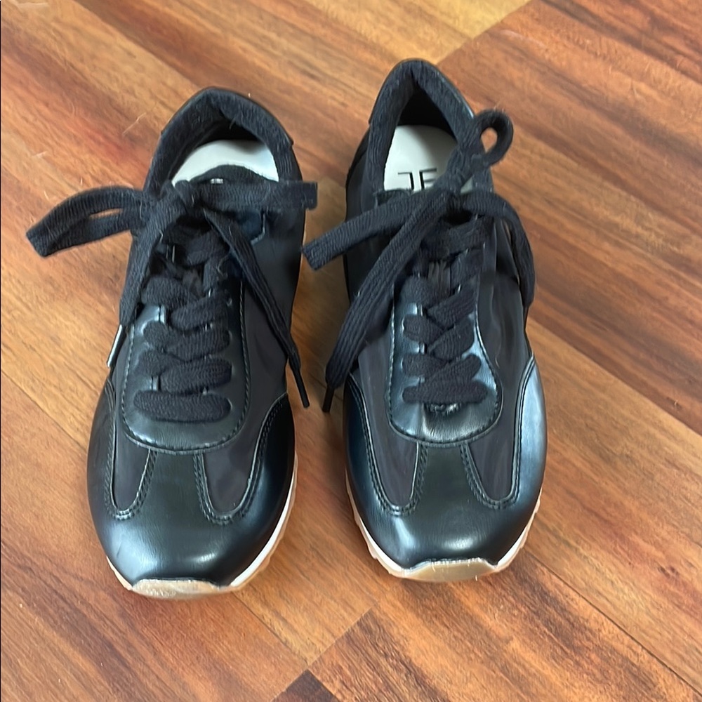 Black Sneakers with White Soles